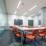 A conference room option to help you decide if you should rent or buy office space
