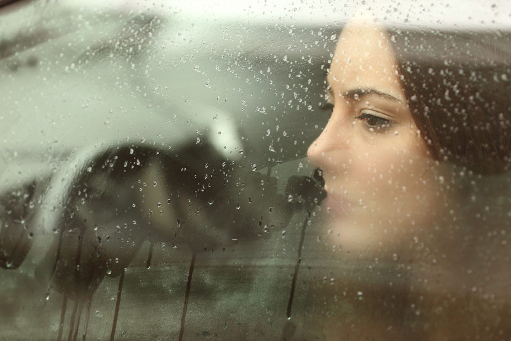 girl is sad due to reducing faith and belief caused by Covid 19