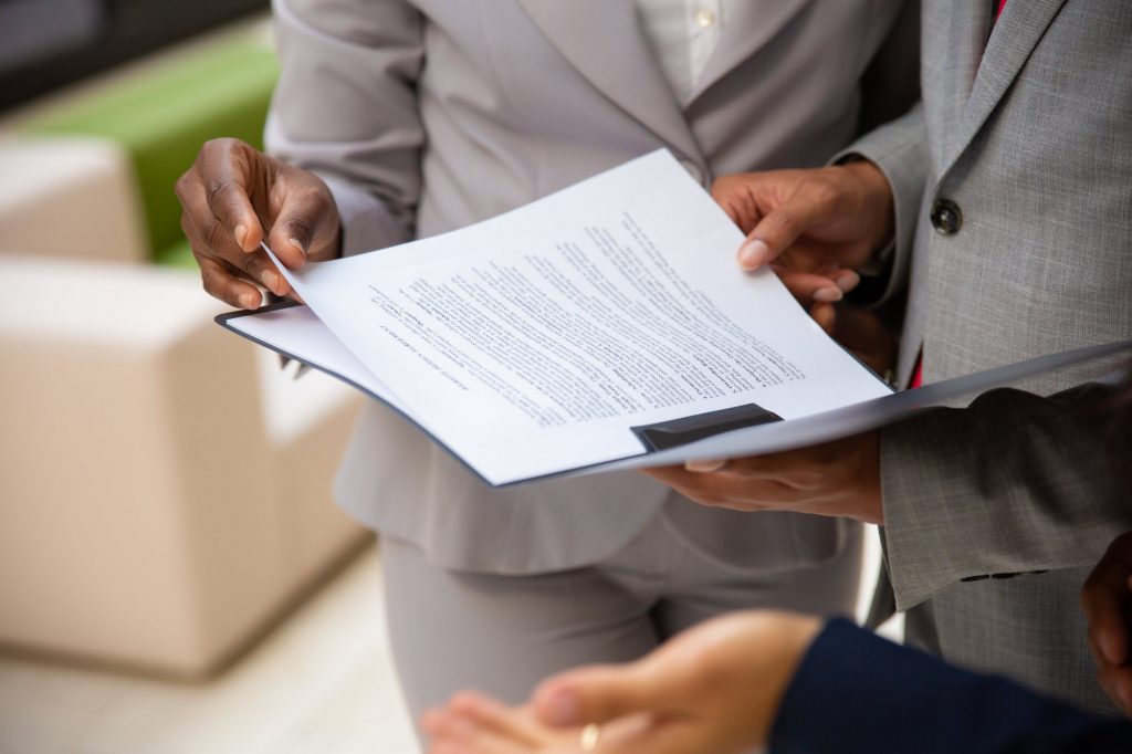 People looking at documents