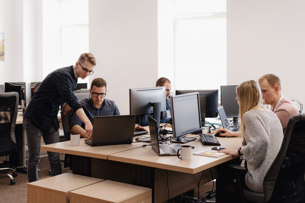 An office with computers and employees.